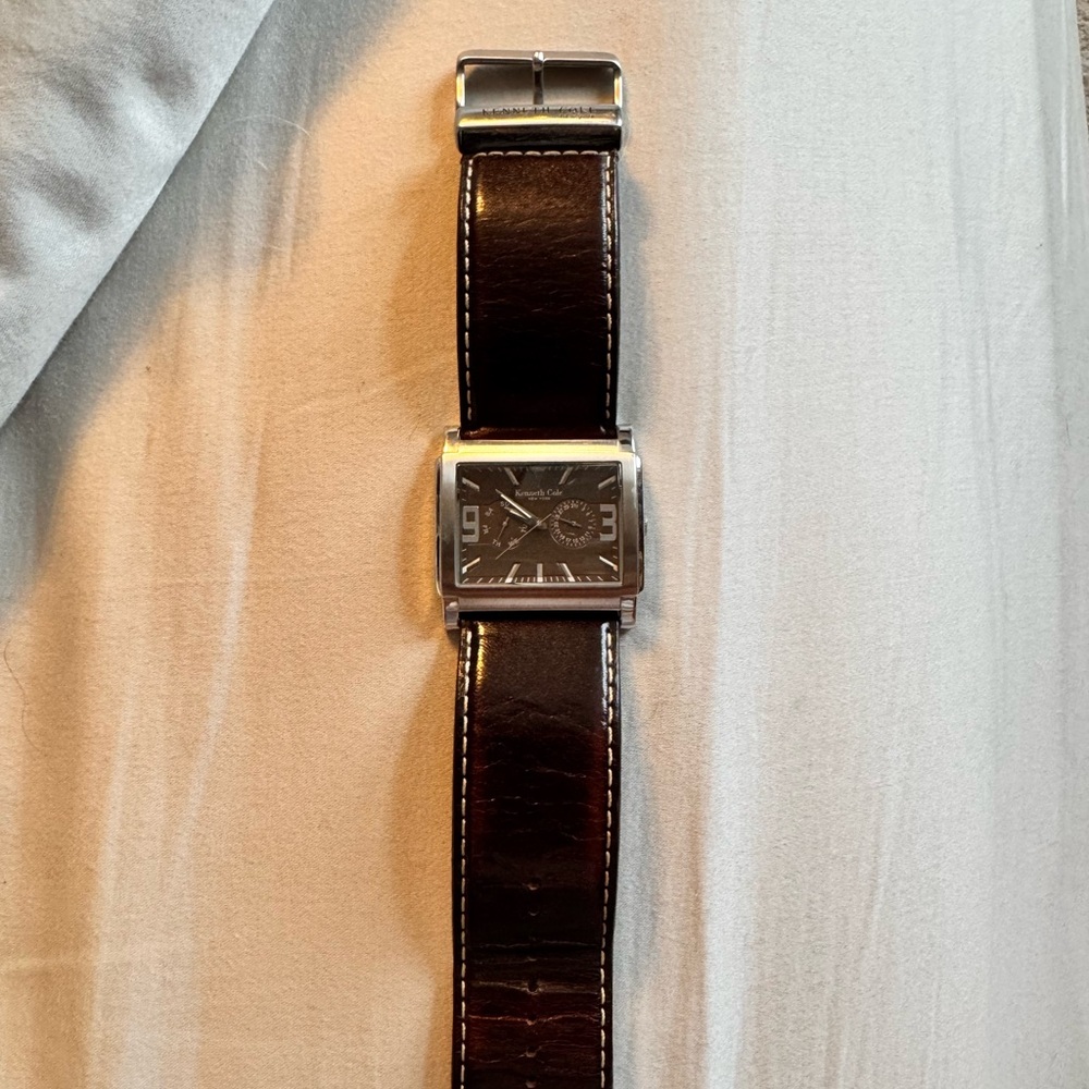 Men's Kenneth Cole watch, great condition. Brown leather band.